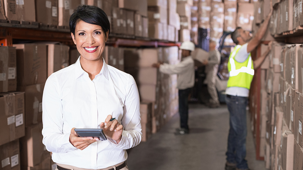 Female professional in a warehouse